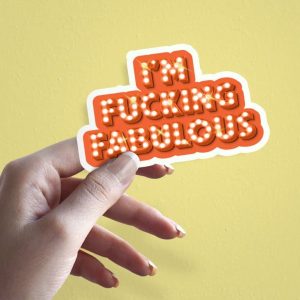 Woman holding I'm Fucking Fabulous empowerment sticker