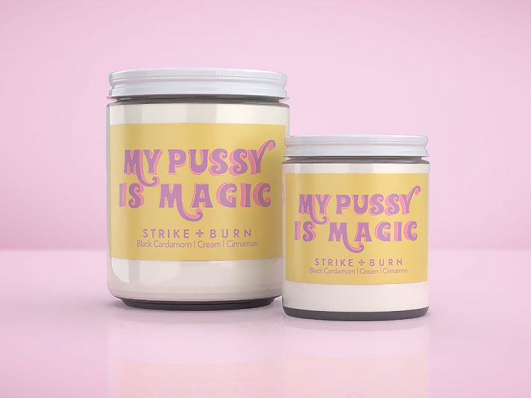 My Pussy Is Magic Candle In 4Oz &Amp; 8Oz Clear Glass Jars On Pink Background, Black Cardamom &Amp; Cinnamon Scent