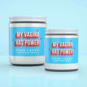 My Vagina Has Power Candle In 4Oz &Amp; 8Oz Clear Glass Jars On Sky Blue Background, Gardenia &Amp; Neroli Scent